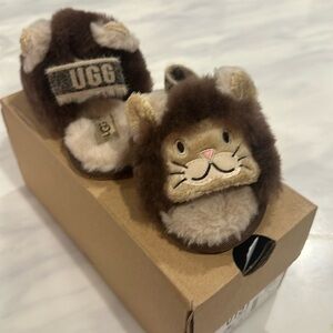 A pair of Ugg toddlers slippers brand new in a box